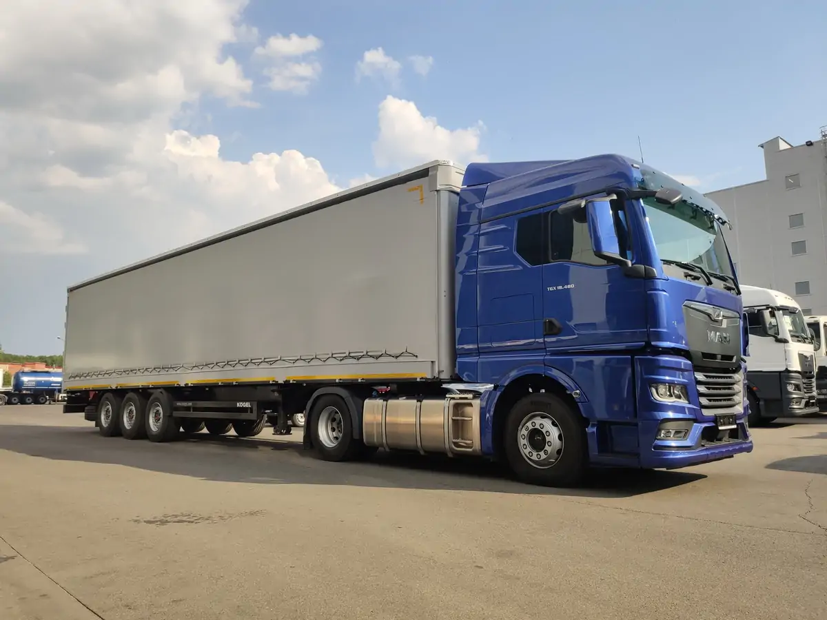 Отгрузка тягача MAN TGX 18.480 со шторно-бортовым полуприцепом KOGEL