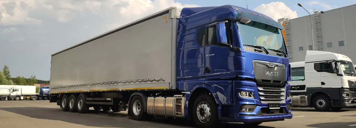 Отгрузка тягача MAN TGX 18.480 со шторно-бортовым полуприцепом KOGEL